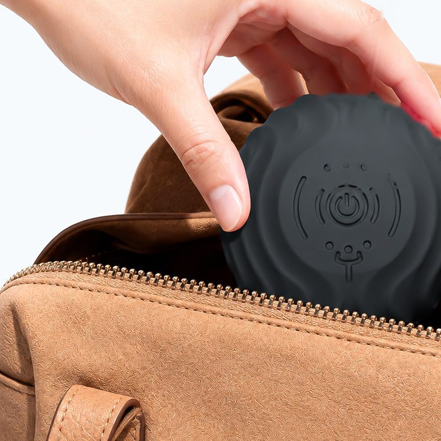 RECOVERO TRIGGER POINT ROLL being packed into a tan carry bag