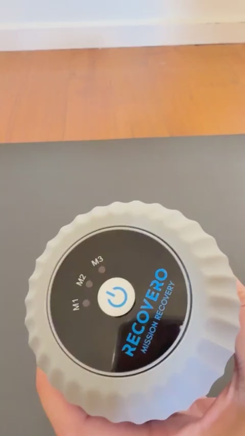 RECOVERO ROLL: pressing the power and mode buttons, then the roller vibrating and rolling